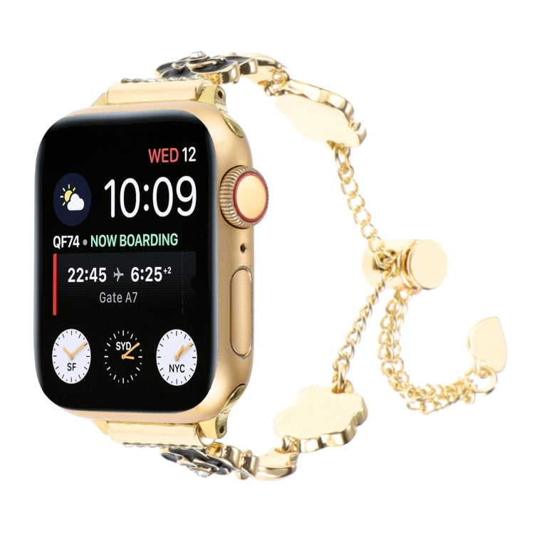 Gold metal chain Apple Watch band with circular charms and clasp