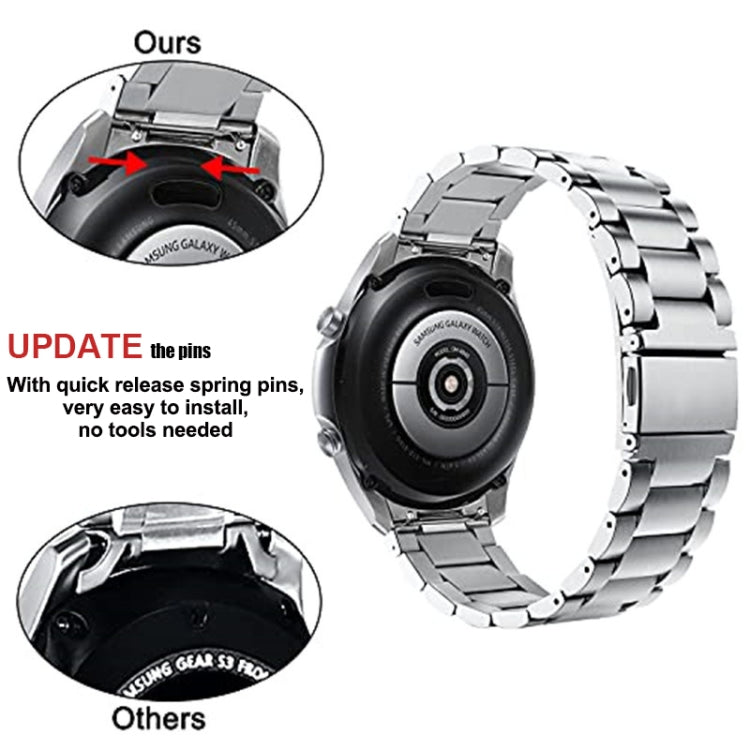 Stainless steel watch band with quick-release spring pins shown on the clasp area.