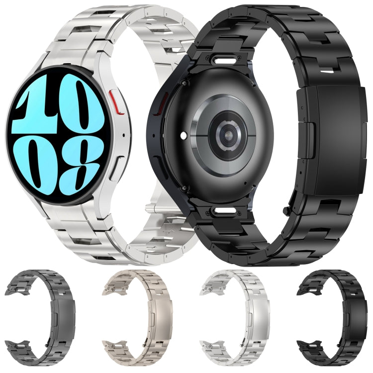 Silver and black titanium metal watch bands with button-style links shown together