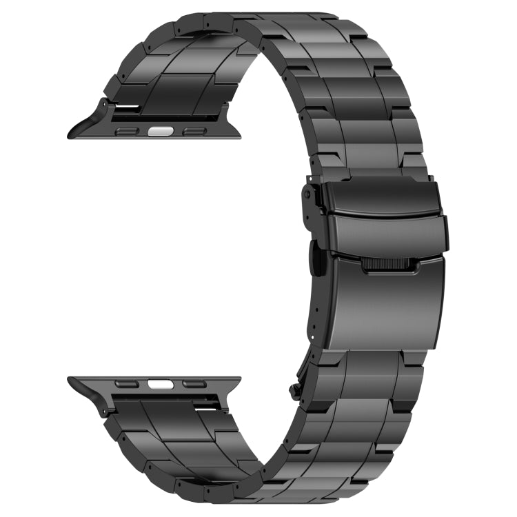 Black titanium steel watch band with trapezoid links and safety buckle, angled view