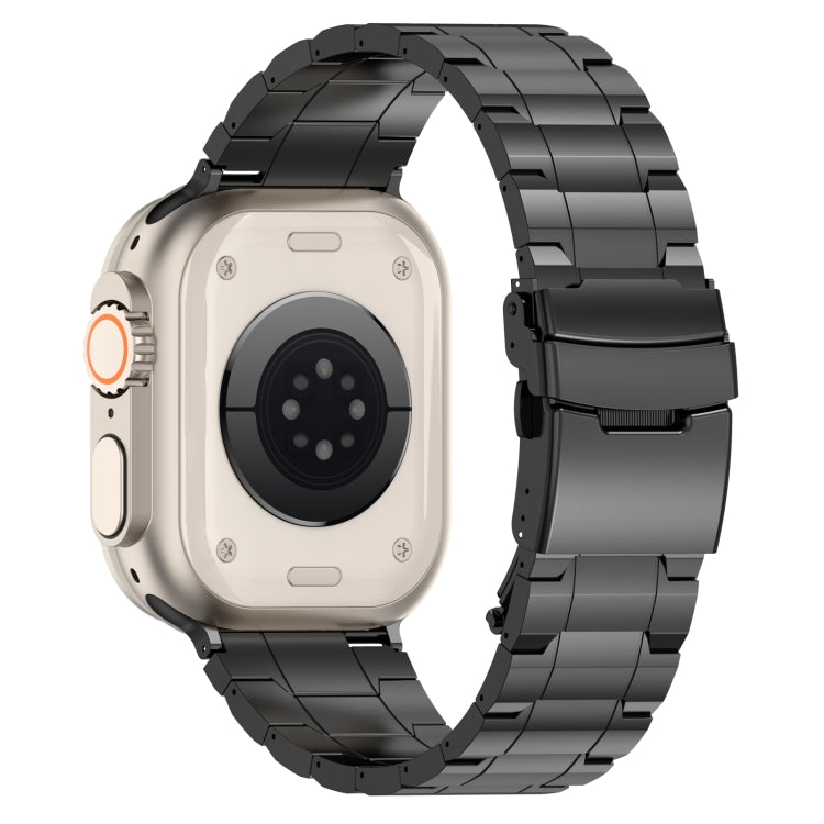 Titanium steel watch band with trapezoid links and safety buckle, black on watch
