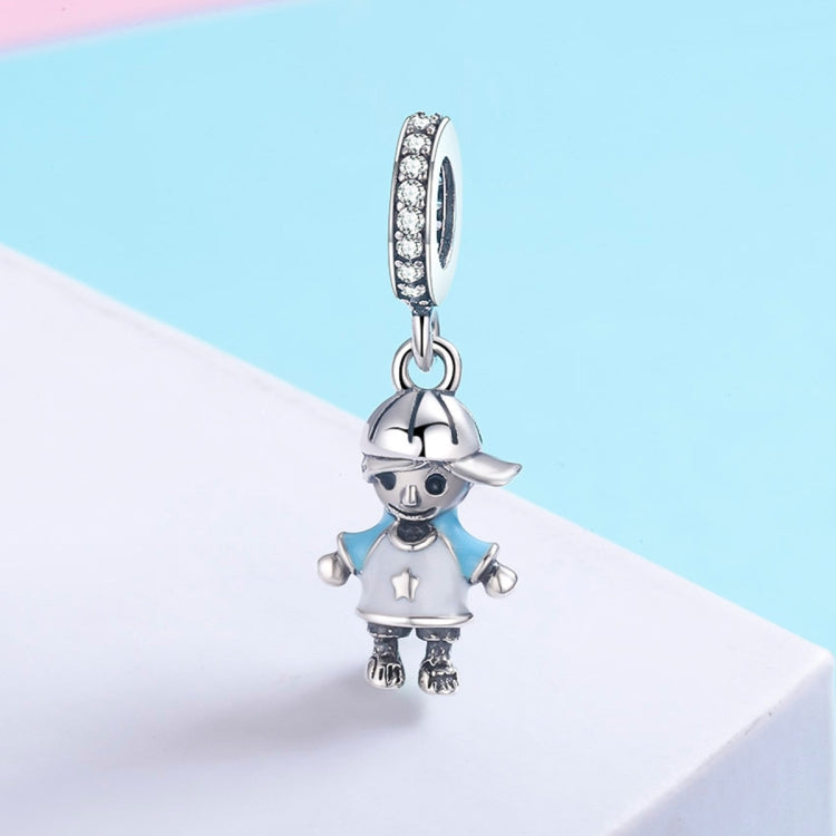 Sterling silver boy charm bead with crystal-studded bail and dangling figure