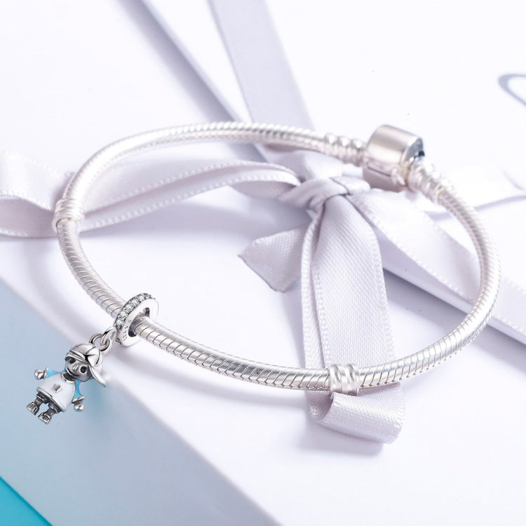 Silver charm bracelet with ribbon bow and robot boy bead pendant
