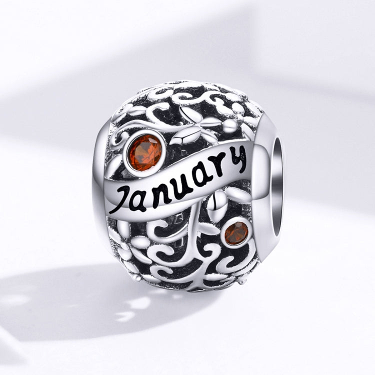 Sterling silver birthstone charm bead with January script and two orange crystals