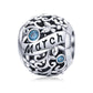 Sterling silver birthstone charm bead with March script and blue crystal accents