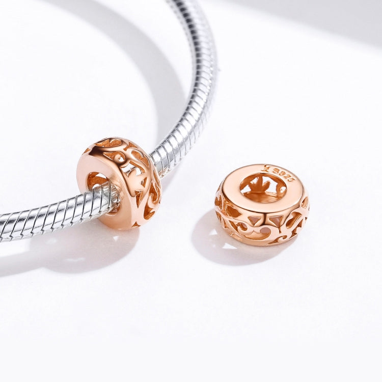 Rose gold charm bead on silver snake chain bracelet