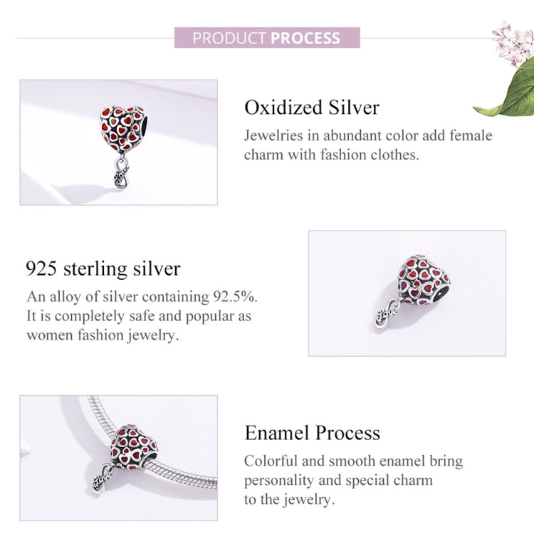Silver heart bead charm with red enamel hearts and small dangling charm