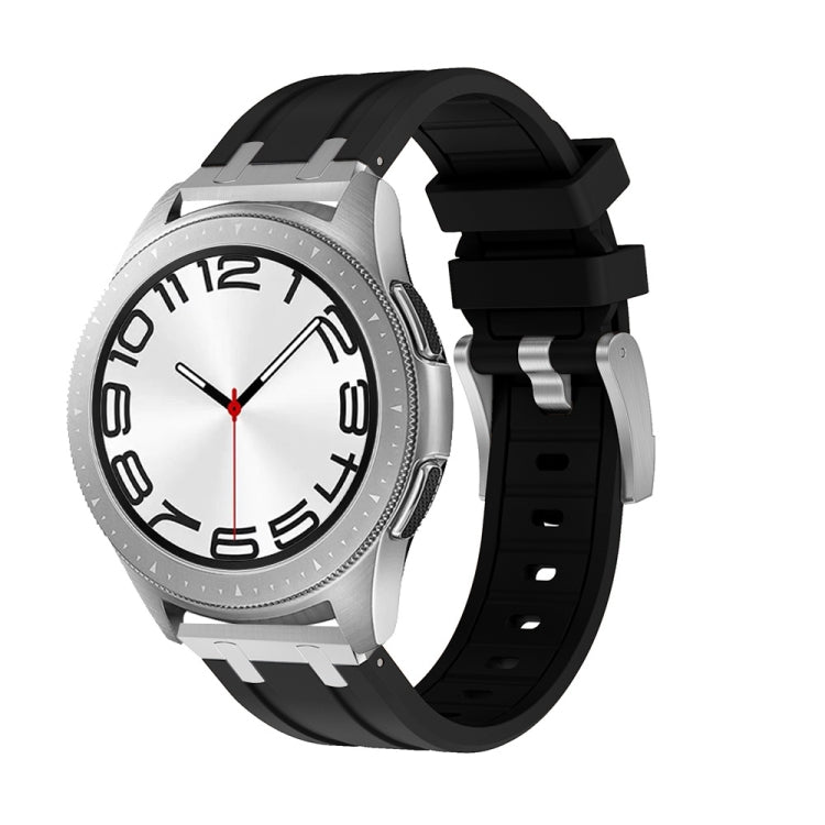 Smartwatch with a black silicone band, silver case, and white dial
