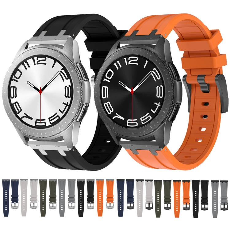 Black and orange silicone watch bands on watches, with a row of additional color options.