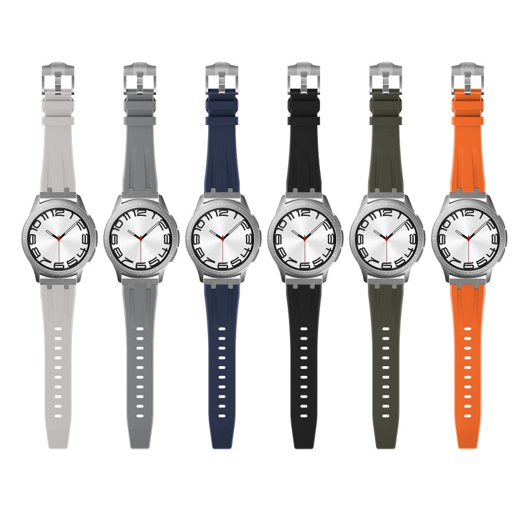 Light-dial watches with silicone bands in light gray, gray, navy, black, olive, and orange.