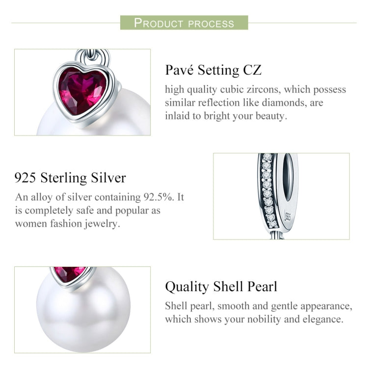 Silver heart pendant charm with red gem center and round white pearl