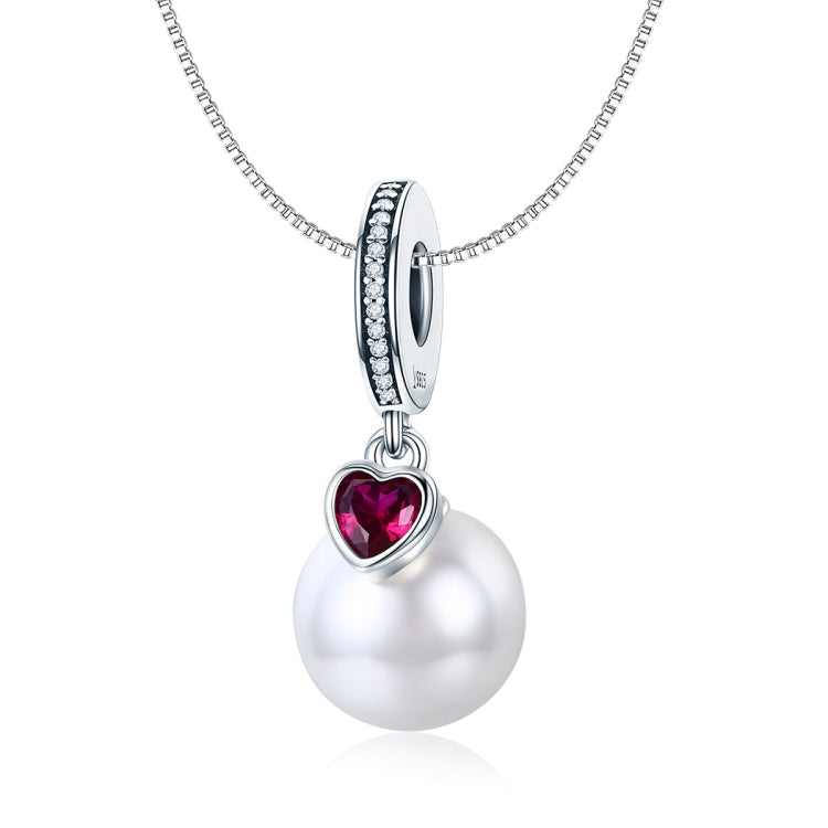 Silver necklace with heart gem and white pearl drop charm on chain