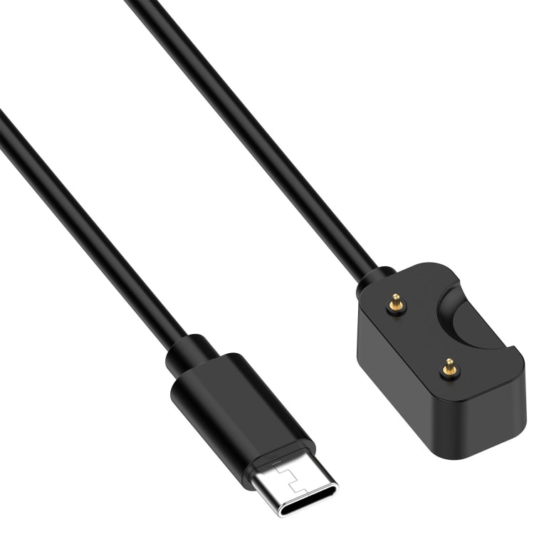 Close-up of black Galaxy Fit 3 charging cable's USB-C plug and two-pin connector