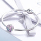 Sterling silver charm bracelet with pink and purple bead accents