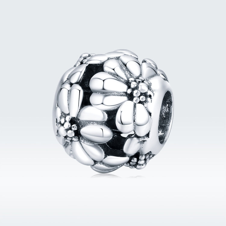 Sterling silver daisy charm bead with oxidized floral texture and round clasp ring