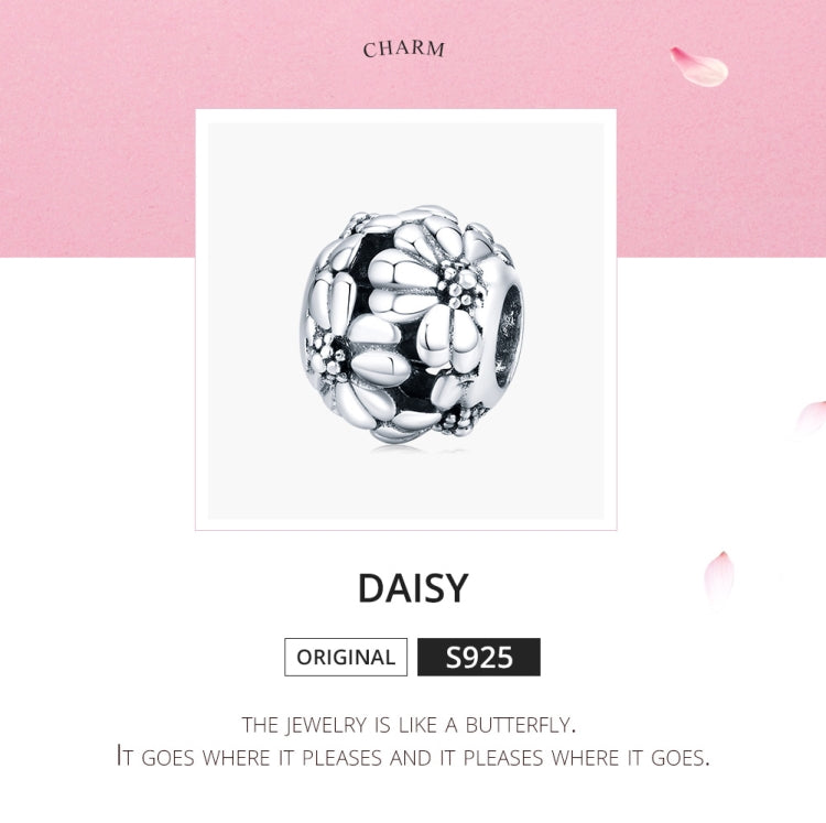 Sterling silver daisy charm bead with embossed petals and sparkling center flower