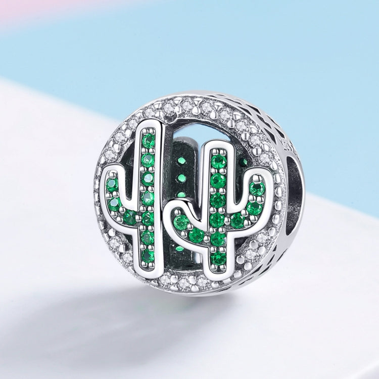Sterling silver cactus charm bead with green crystal inlay and sparkling pave border