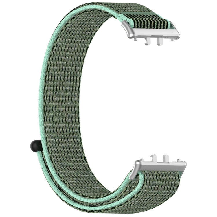 Green nylon loop watch band with mint edging and metal connectors