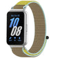 Tan nylon loop watch band with mint edging and yellow accents, shown on a smartwatch