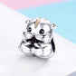 Sterling silver hamster charm bead with enamel face, rounded ears, and stripe accents