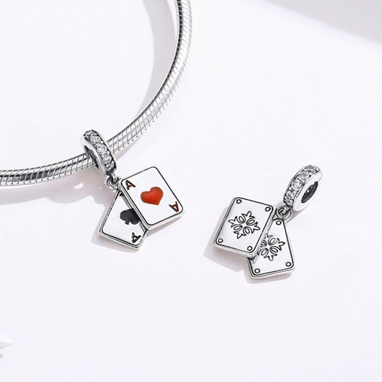Snake-chain bracelet with red-heart A card charm and second silver charm with floral design