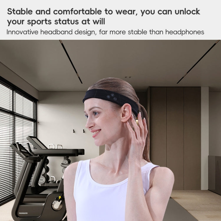 Black Bluetooth sports headband worn by a woman during a workout.