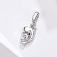 Silver-tone dolphin charm pendant with top loop and detailed dolphin silhouette