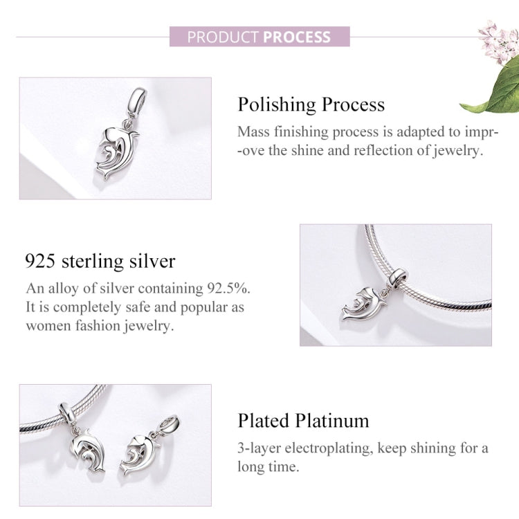 Silver-tone dolphin charm pendant shown with a top hanging loop