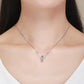 Sterling silver daisy wreath pendant necklace with orange flower center on thin chain