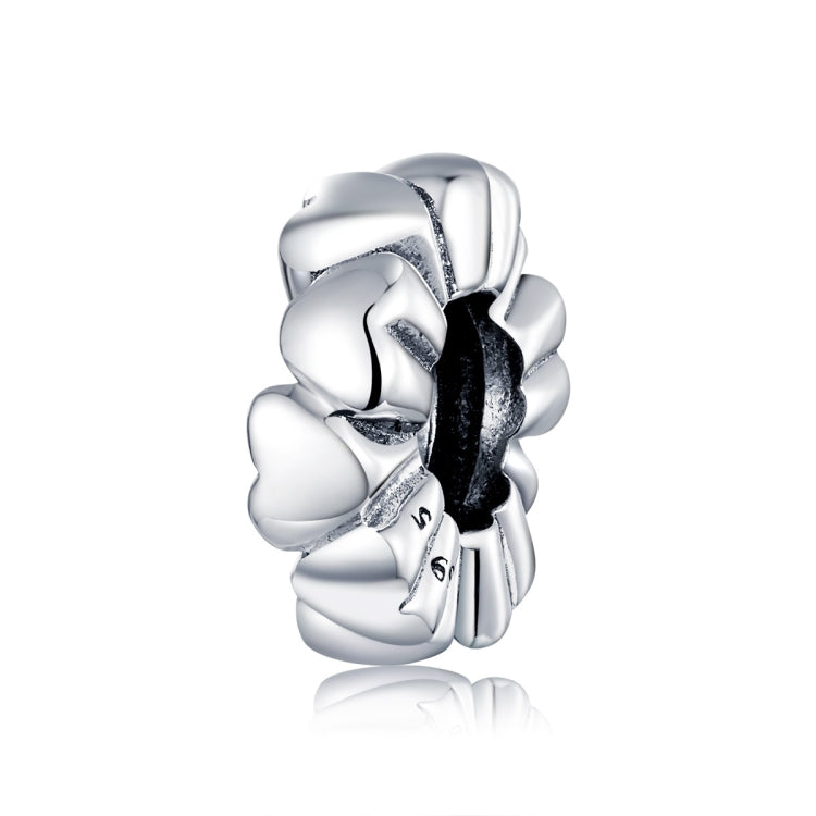 Heart-shaped silver charm bead with heart-to-heart links, polished and dark oxidized center