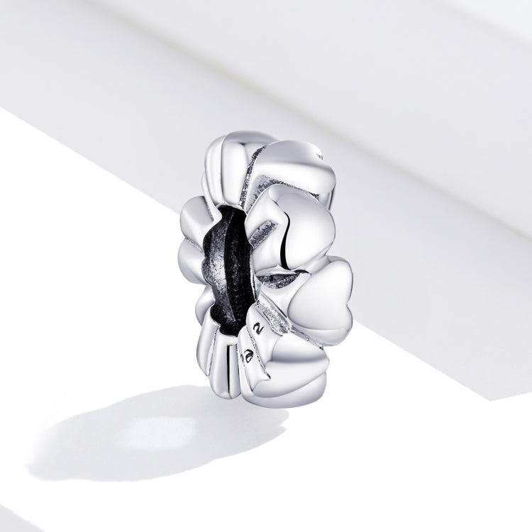 Heart-shaped silver charm bead with stacked heart links and dark oxidized detail