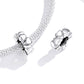 Silver heart charm bead with heart-shaped links and dark oxidized center on chain