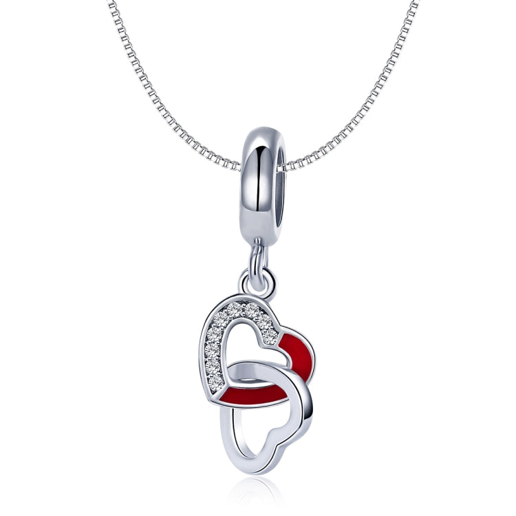 Sterling silver heart-to-heart charm pendant with red enamel and stones, shown on chain