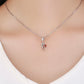 Silver necklace pendant with heart-to-heart charm, red enamel, and small linked heart detail