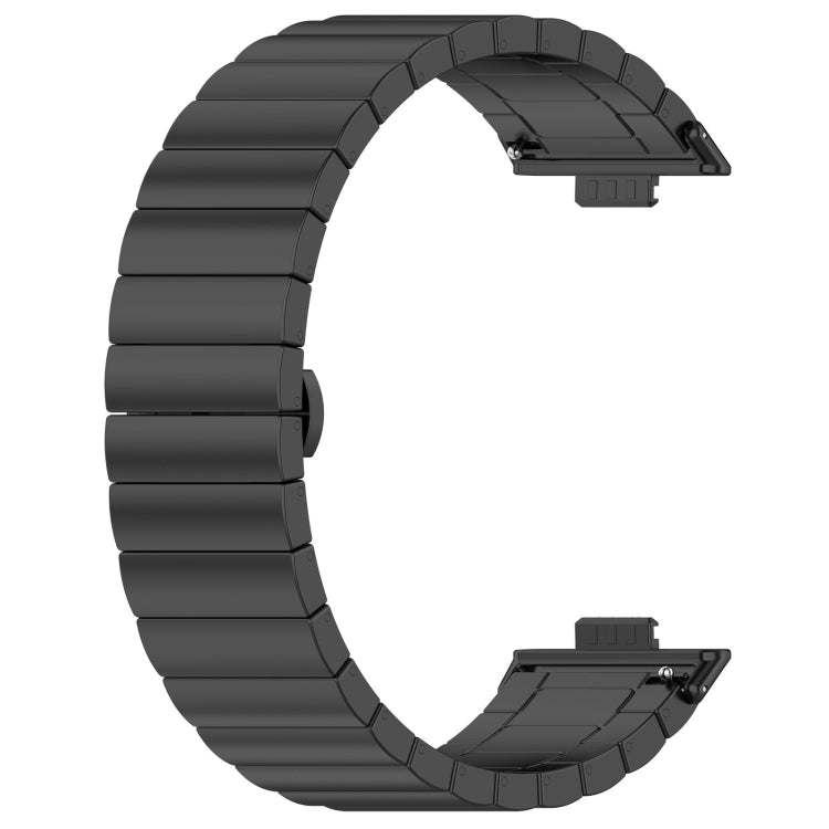 Black stainless steel watch band shown open, with linked segments and connector ends.