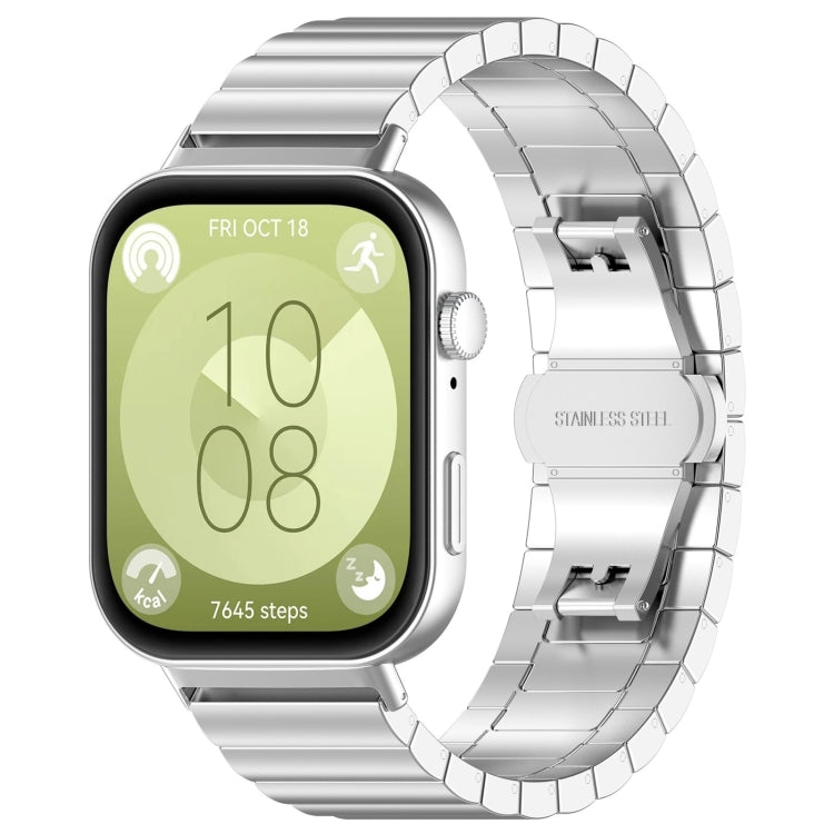 Silver stainless steel watch band with linked segments and clasp, shown on a smartwatch.
