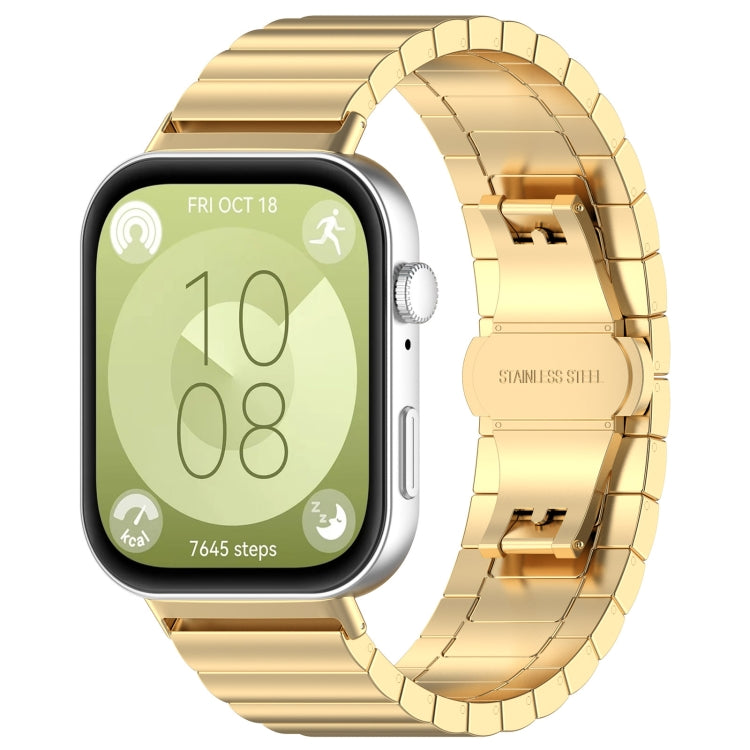 Gold stainless steel watch band with linked segments and clasp, shown on a smartwatch.