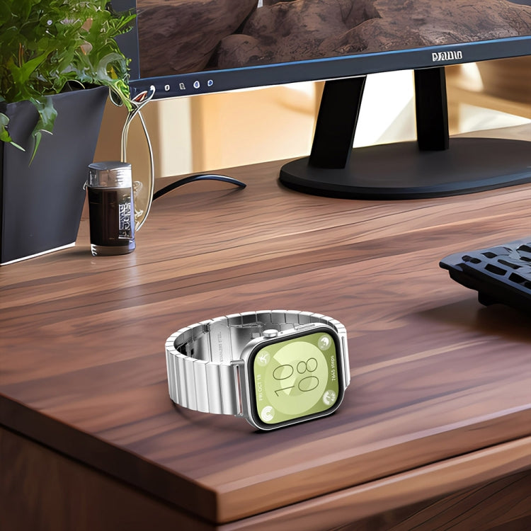 Silver stainless steel watch band attached to a smartwatch, shown from the front