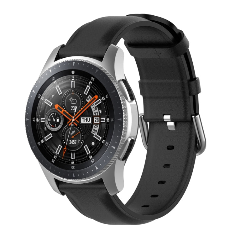 Black watch strap with round tail buckle and silver clasp, perforated band