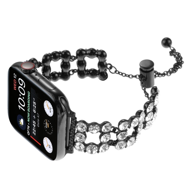 Black rhinestone metal bracelet watch band with Apple Watch, angled view
