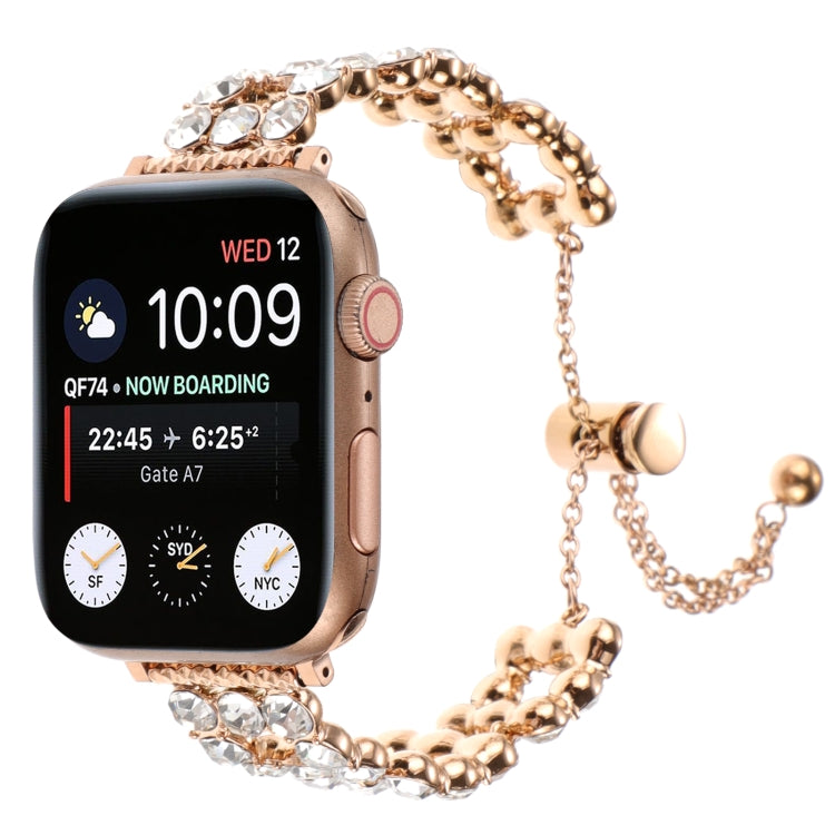 Rose gold-tone rhinestone metal bracelet watch band with Apple Watch and chain clasp