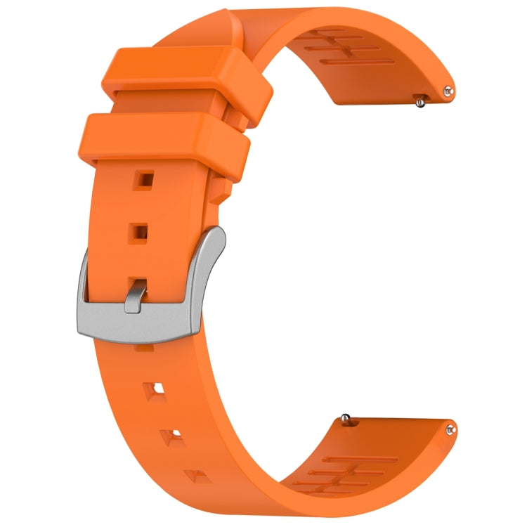 Orange fluororubber watch band shown separately, with buckle and adjustment holes.