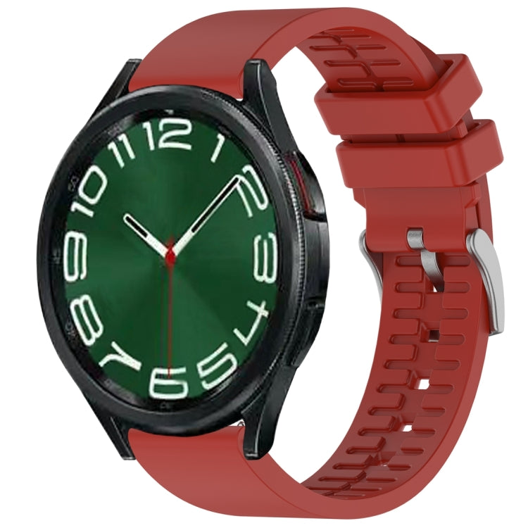Red fluororubber watch band fitted to a black smartwatch