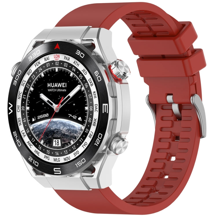 Red fluororubber watch band fitted to a silver Huawei smartwatch
