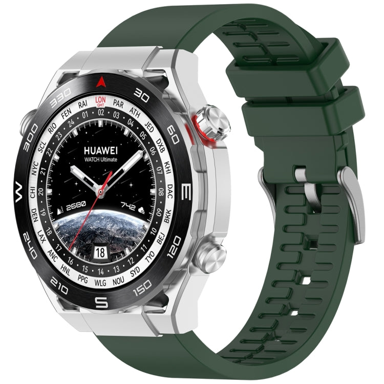 Dark green fluororubber watch band fitted to a silver smartwatch.