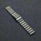 Dark gray titanium alloy watch band with flat, segmented links