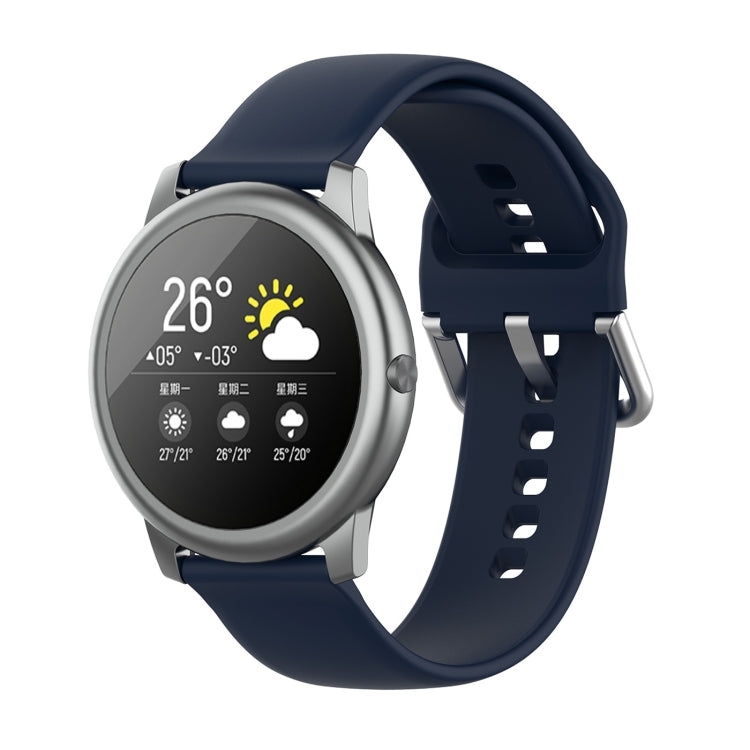 Dark blue silicone watch strap with metal buckle and silver watch case