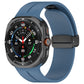 Blue silicone magnetic folding buckle watch band attached to a smartwatch