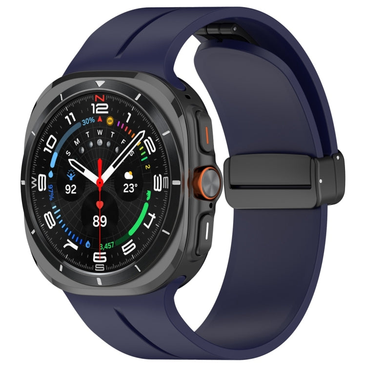 Midnight blue silicone watch band with magnetic folding clasp attached to a dark smartwatch