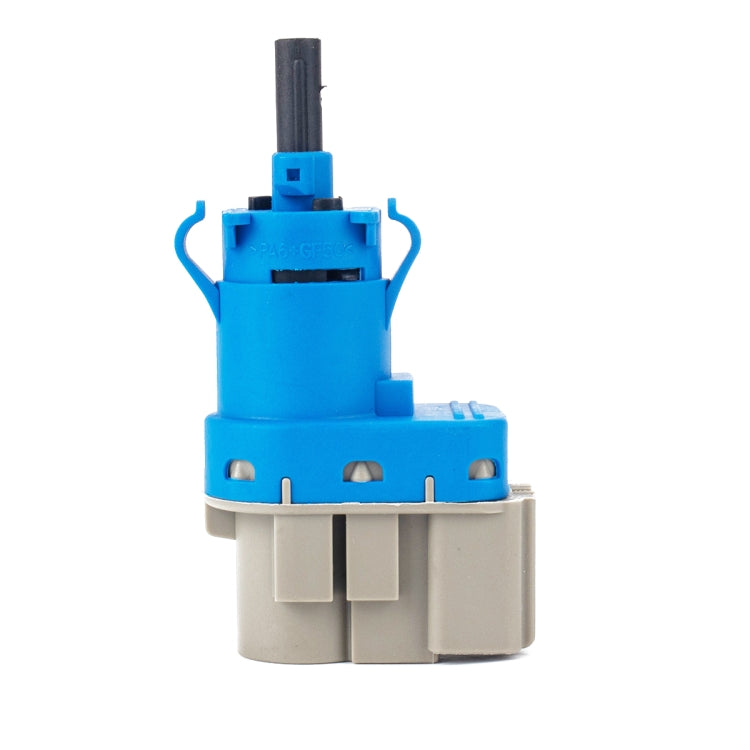 Brake light switch with blue body, gray terminals, and black pin connector